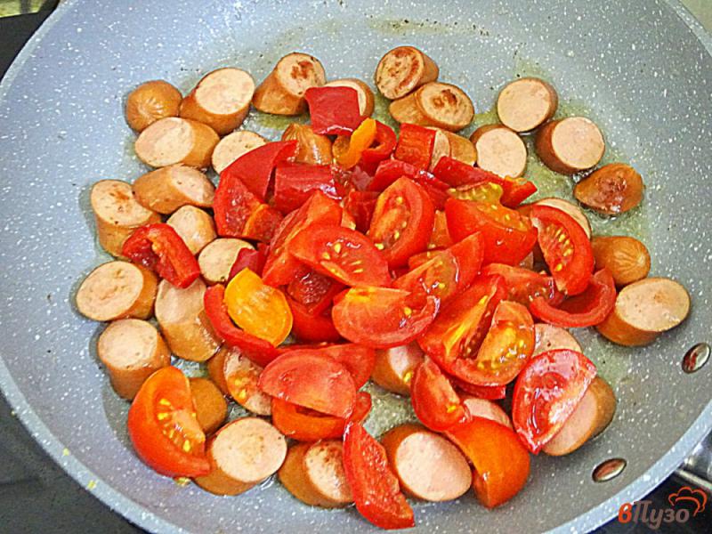 Фото приготовление рецепта: Сосиски под соусом по-итальянски шаг №7