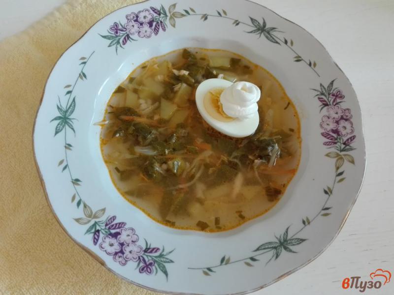 Фото приготовление рецепта: Капустный суп со щавелем и перловой крупой шаг №10