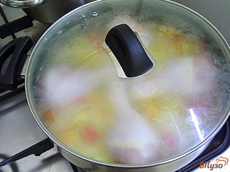 Фото приготовление рецепта: Куриные голени с рисом и овощами шаг №9