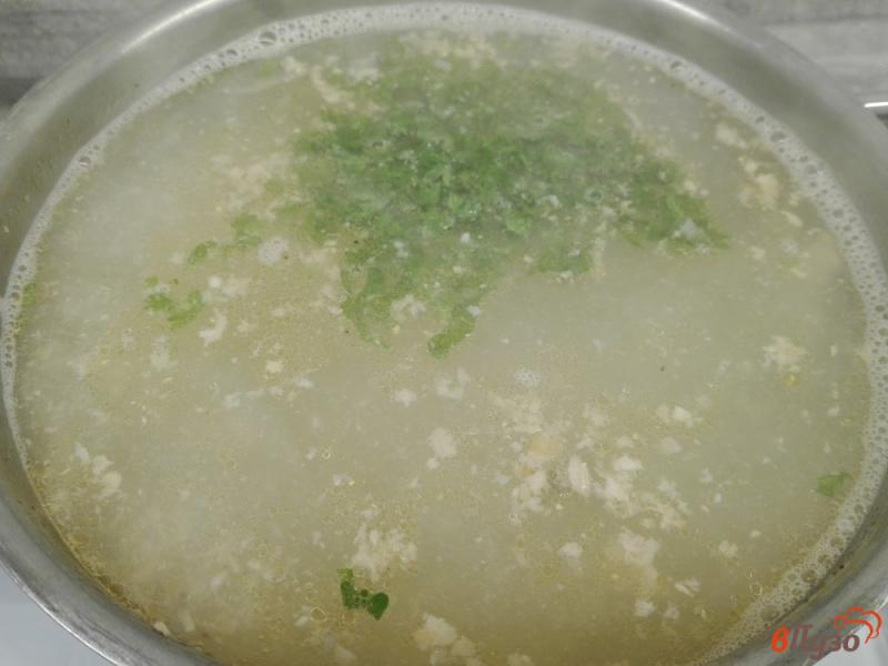 Фото приготовление рецепта: Суп из консервированной горбуши шаг №6