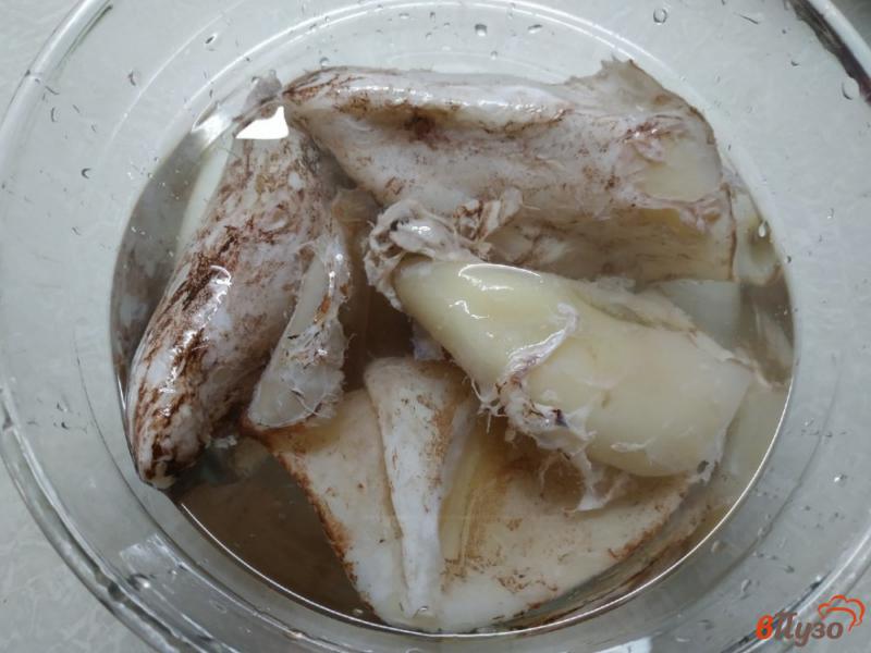 Фото приготовление рецепта: Кальмары тушеные в сметане шаг №1