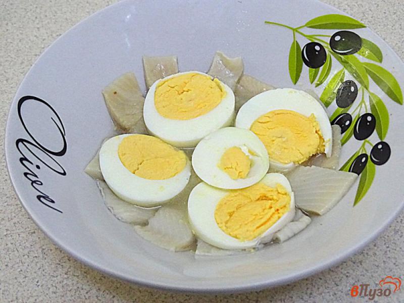 Фото приготовление рецепта: Закуска из сельди в желе шаг №5