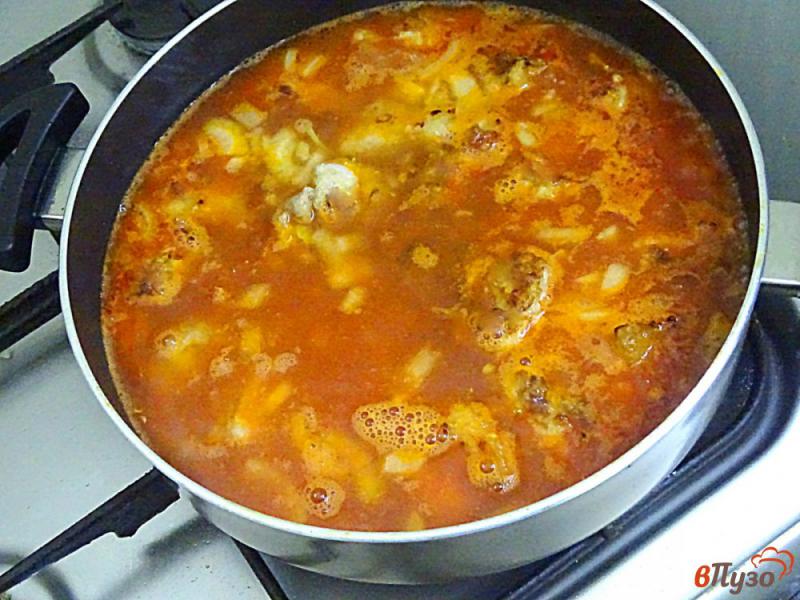 Фото приготовление рецепта: Свинина в томатном соусе шаг №7
