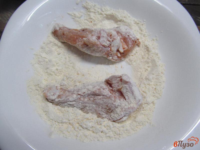 Фото приготовление рецепта: Куриные крылья в овсяной панировке шаг №6