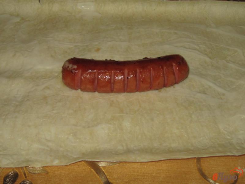 Фото приготовление рецепта: Сосиски в лаваше с морковью шаг №5