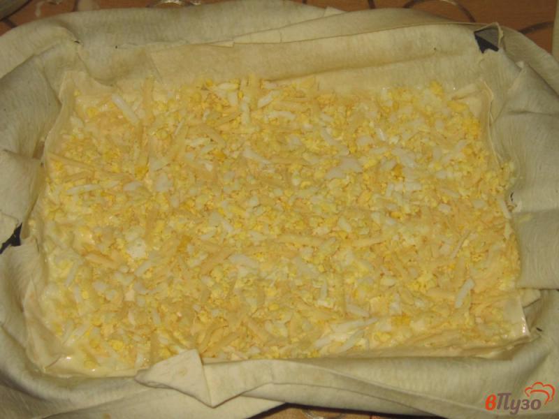 Фото приготовление рецепта: Ачма из лаваша с яйцом и сыром шаг №11