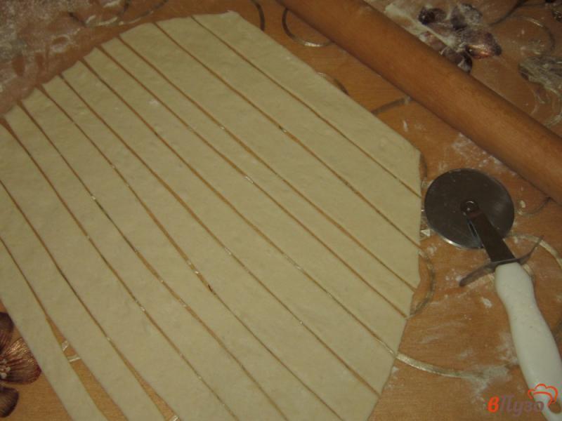 Фото приготовление рецепта: Сосиски в тесте с кетчупом шаг №5