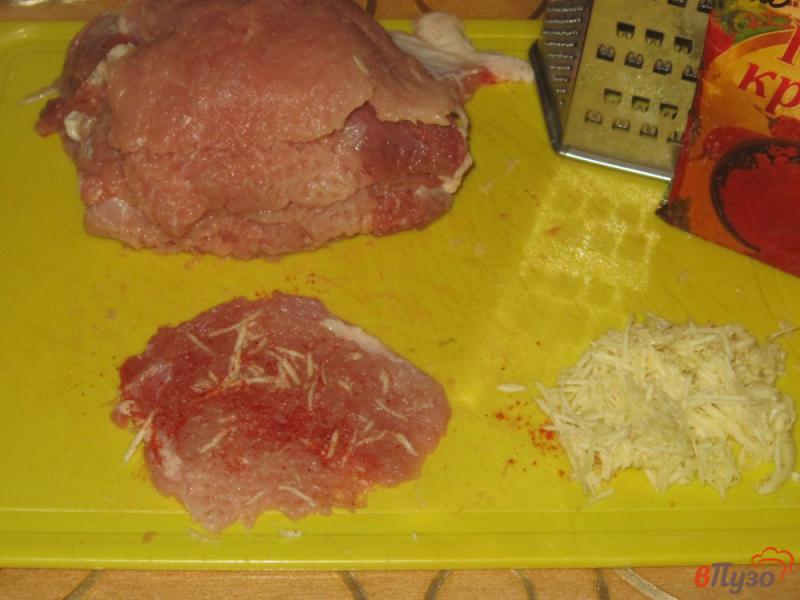 Фото приготовление рецепта: Отбивные из свинины с чесноком и острым перцем шаг №2