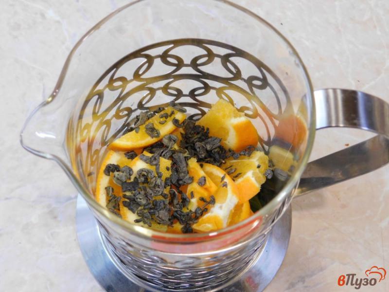 Фото приготовление рецепта: Апельсиновый чай с имбирем шаг №3