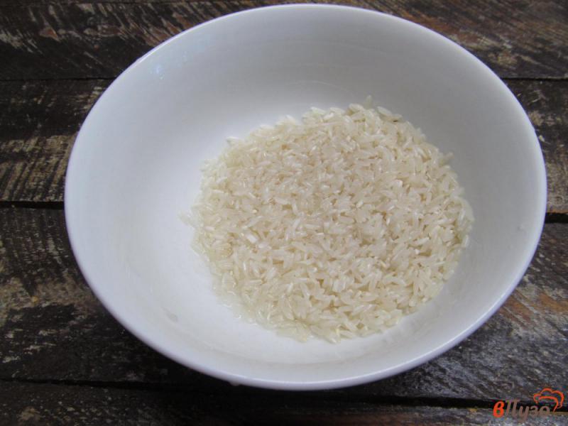 Фото приготовление рецепта: Рисовый суп с баклажаном шаг №3