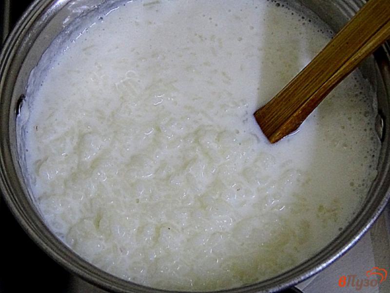 Фото приготовление рецепта: Каша рисовая на молоке шаг №5