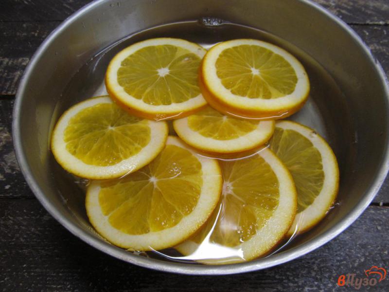 Фото приготовление рецепта: Карамелизированные апельсины в шоколаде шаг №2