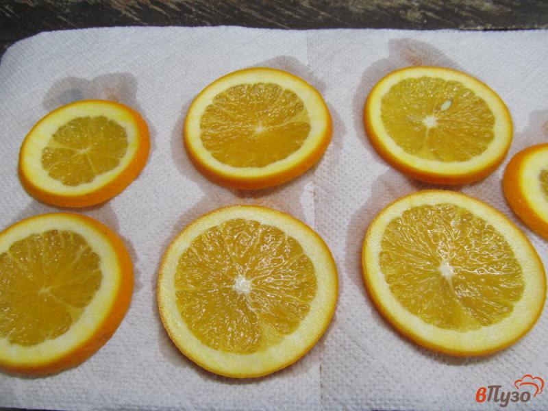 Фото приготовление рецепта: Карамелизированные апельсины в шоколаде шаг №3