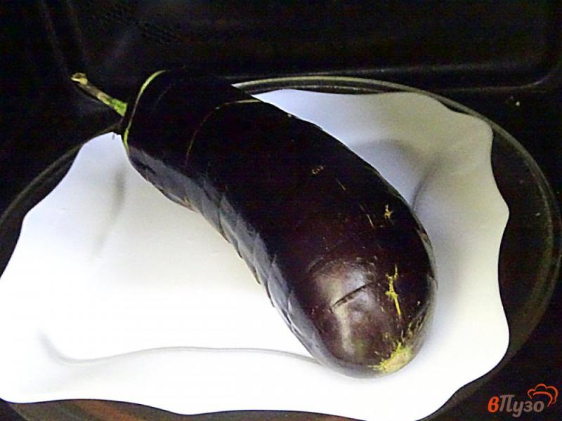Фото приготовление рецепта: Баклажаны запеченные в микроволновке шаг №4