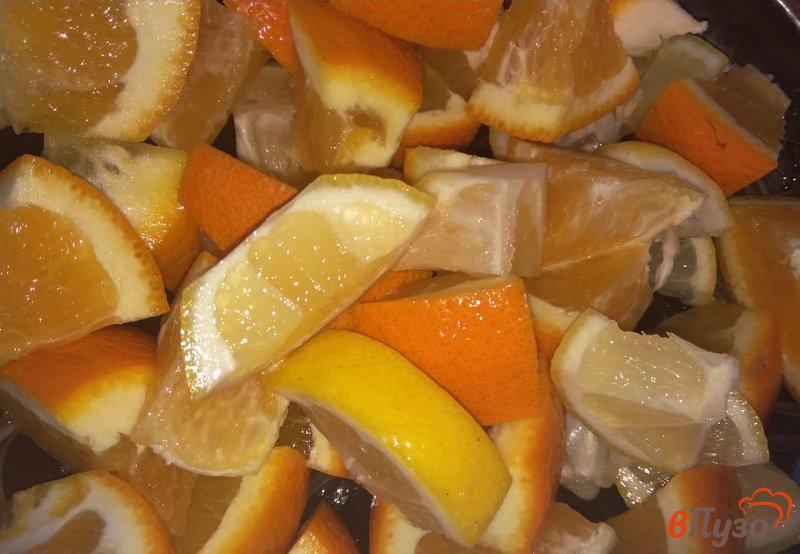 Фото приготовление рецепта: Варенье из физалиса с апельсинами и лимоном шаг №4
