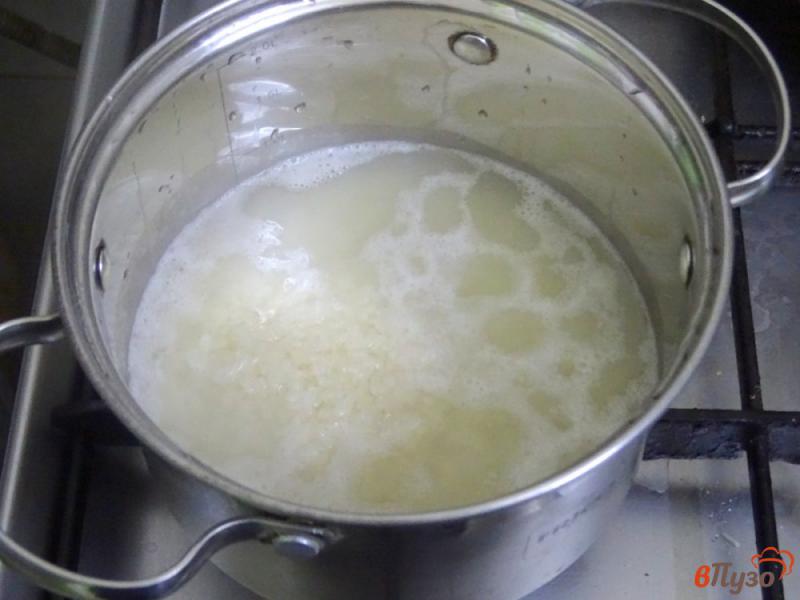 Фото приготовление рецепта: Рисовая каша с тыквой шаг №5