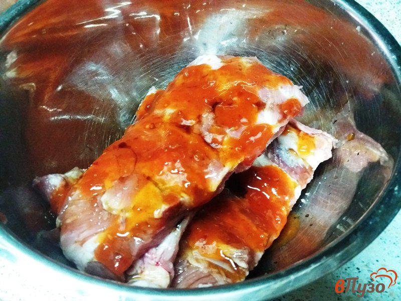 Фото приготовление рецепта: Свиные ребрышки гриль шаг №4