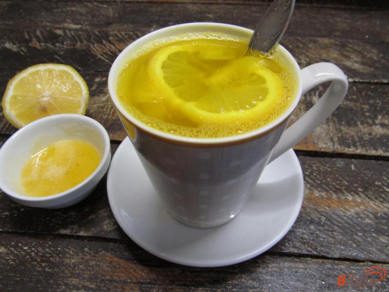 Фото приготовление рецепта: Чай с куркумой соком лимона и чесноком шаг №7