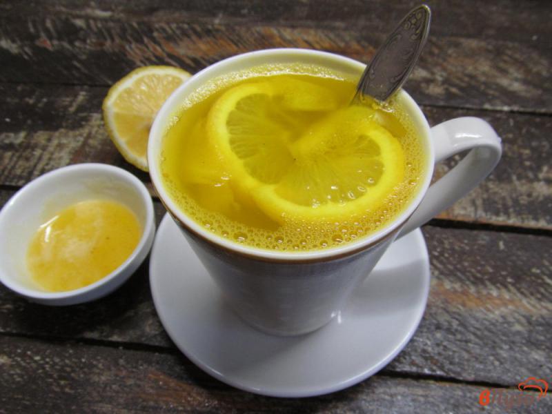 Фото приготовление рецепта: Чай с куркумой соком лимона и чесноком шаг №8