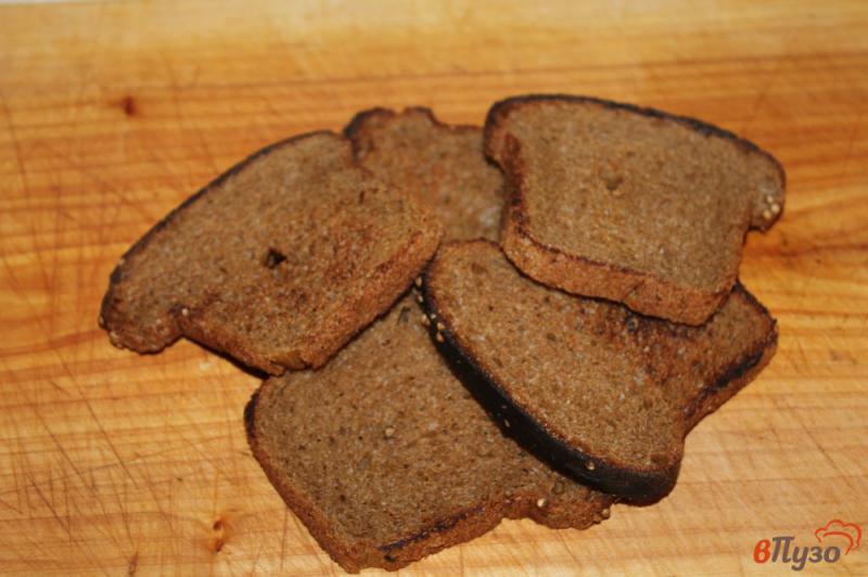 Фото приготовление рецепта: Бутерброды с пряной килькой шаг №3