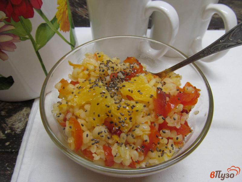 Фото приготовление рецепта: Булгур с сухофруктами и соком апельсина шаг №10