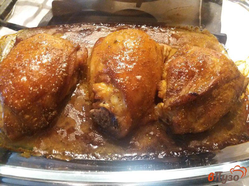 Фото приготовление рецепта: Куриные бедрышки в маногово-соевом маринаде шаг №9