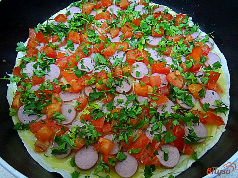 Фото приготовление рецепта: Пирог из лаваша с яйцами и сосисками шаг №11