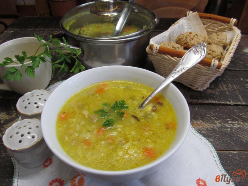 Фото приготовление рецепта: Рисовый суп с фасолью и грибным соусом шаг №6