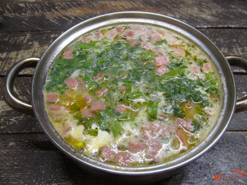 Фото приготовление рецепта: Фасолевый суп с колбасой и щавелем шаг №7