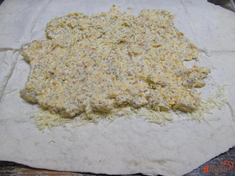 Фото приготовление рецепта: Пирог из лаваша с творогом тыквой и курагой шаг №7