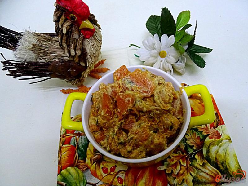 Фото приготовление рецепта: Тыква в сметанном соусе с чесноком. шаг №7