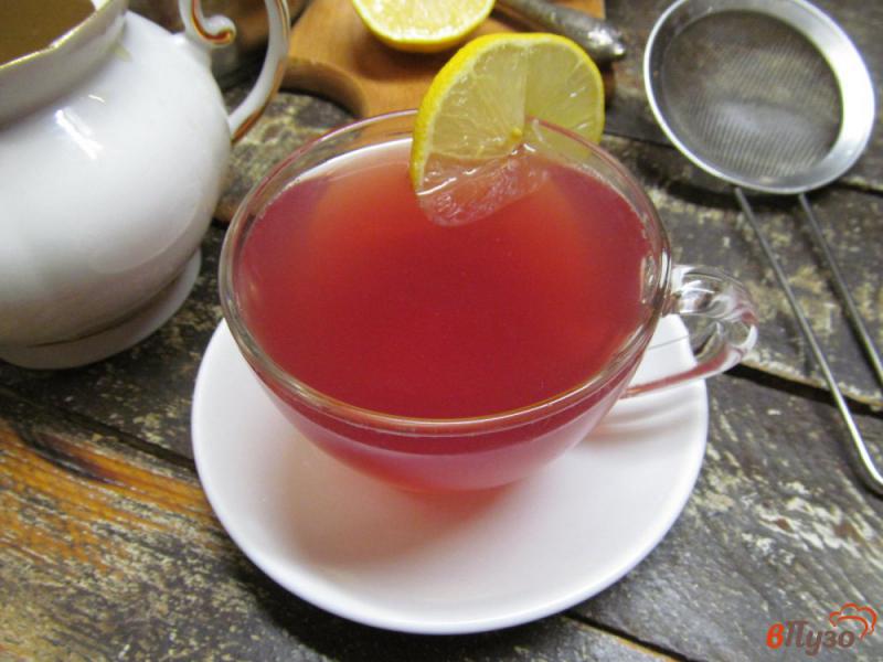 Фото приготовление рецепта: Фруктовый зеленый чай с малиной и имбирем шаг №6