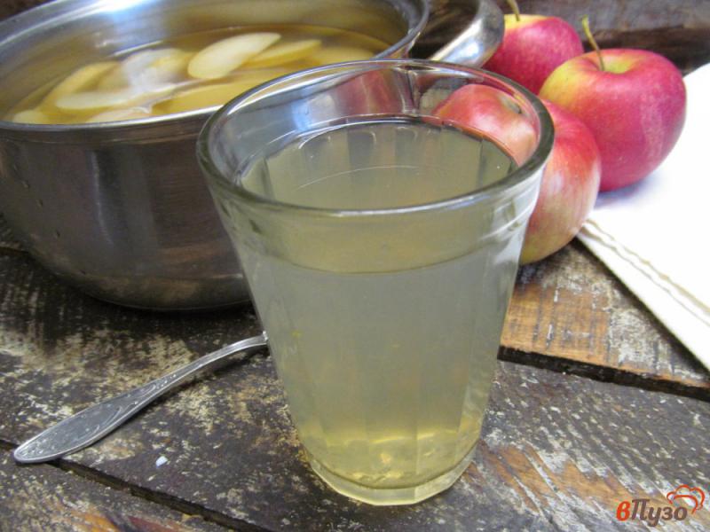 Фото приготовление рецепта: Мандариново-яблочный компот с ванилью шаг №6
