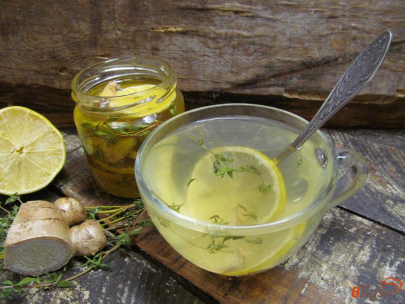 Фото приготовление рецепта: Сироп - настойка из лимона и имбиря на меде шаг №6