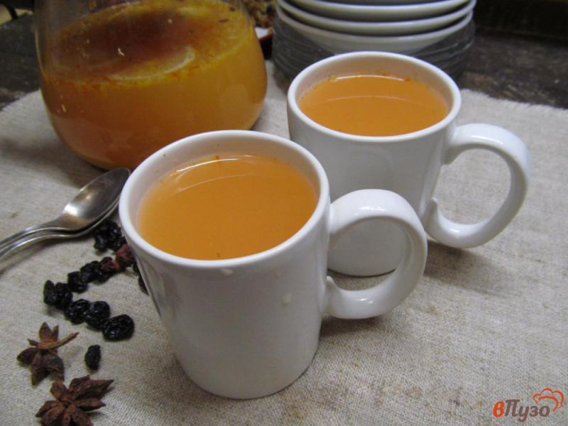 Фото приготовление рецепта: Согревающий чай из облепихи с имбирем и лимоном шаг №6