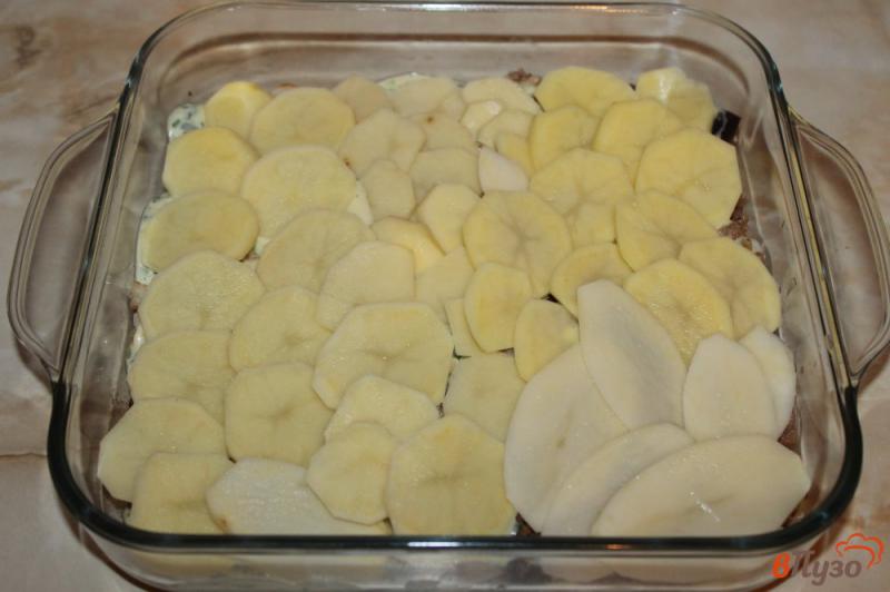 Фото приготовление рецепта: Картофельная запеканка с фаршем, баклажаном и цветной капустой шаг №7