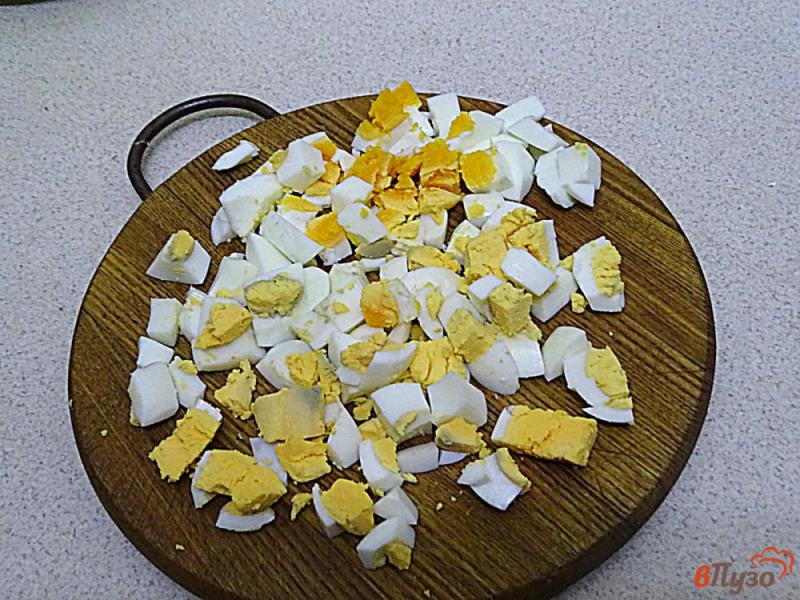 Фото приготовление рецепта: Суп из замороженного щавеля с яйцами и сметаной шаг №4