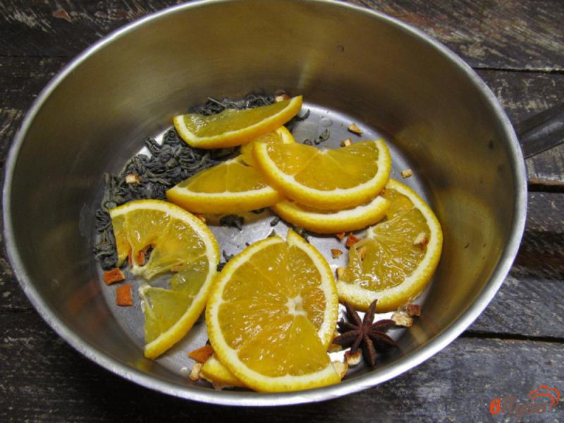Фото приготовление рецепта: Апельсиновый чай шаг №3