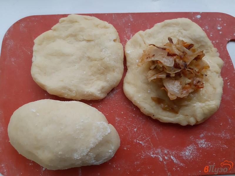 Фото приготовление рецепта: Пирожки печеные с квашеной капустой шаг №9
