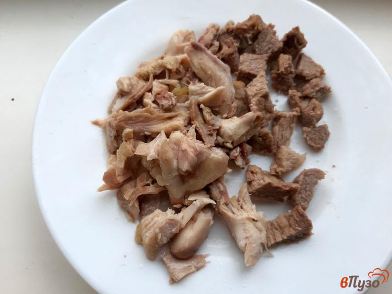 Фото приготовление рецепта: Солянка сборная с мясом и колбасками шаг №11