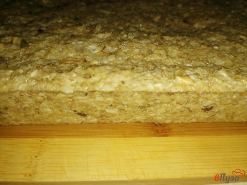 Фото приготовление рецепта: Хлеб из отрубей с семечками на кефире шаг №7