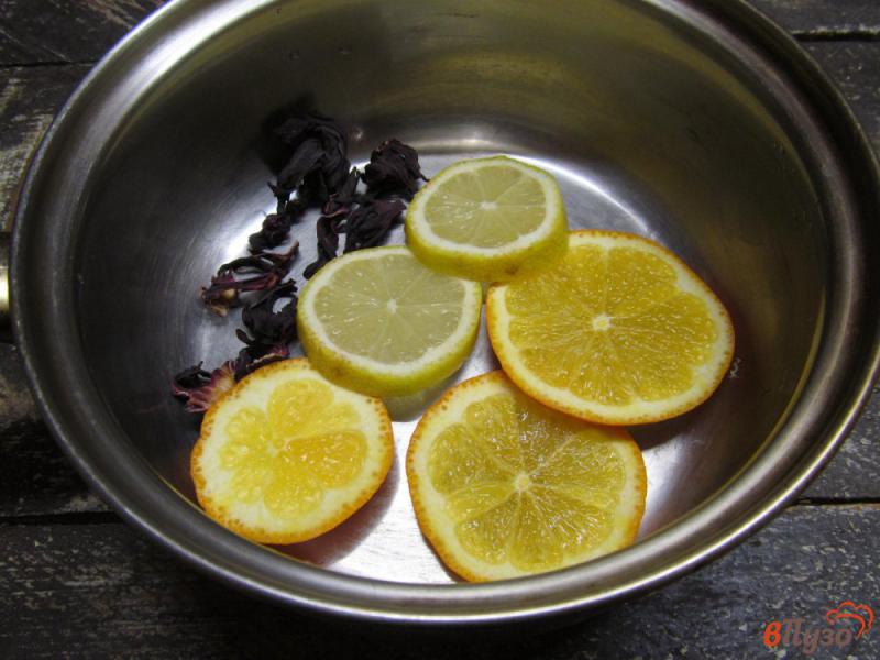 Фото приготовление рецепта: Цитрусовый чай с каркаде шаг №4