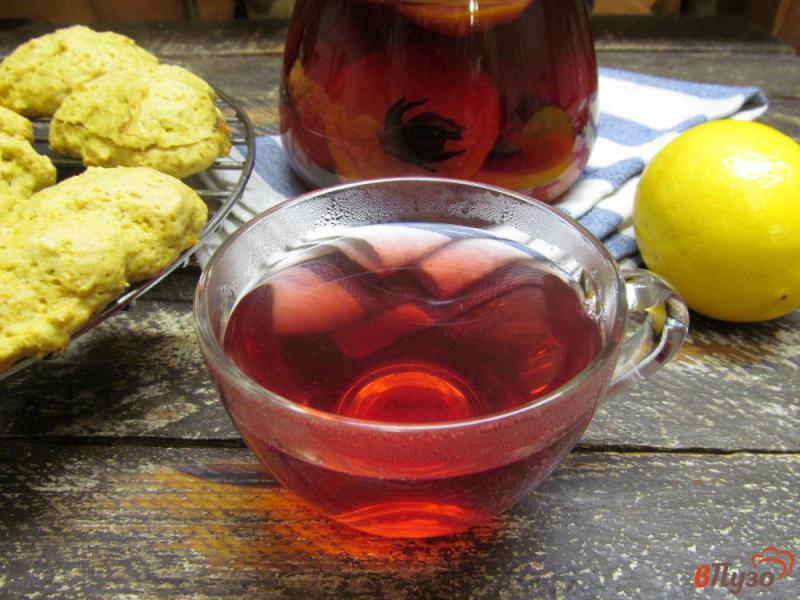 Фото приготовление рецепта: Цитрусовый чай с каркаде шаг №6