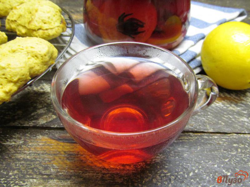 Фото приготовление рецепта: Цитрусовый чай с каркаде шаг №7