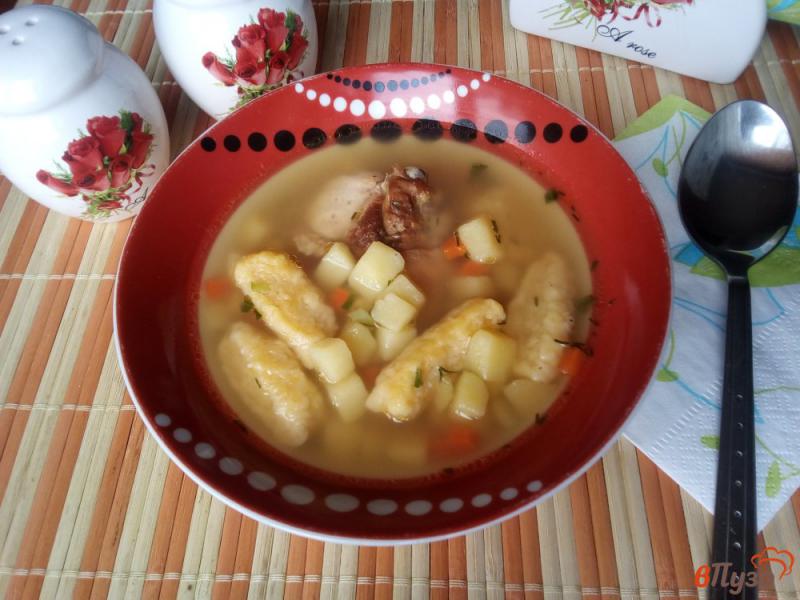 Фото приготовление рецепта: Куриный суп с сырными галушками шаг №10