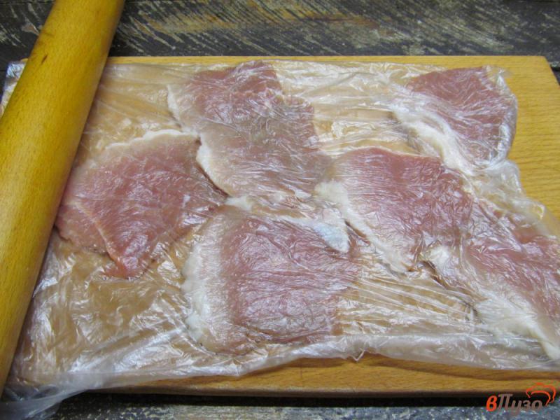 Фото приготовление рецепта: Свиные отбивные в овсяном кляре шаг №2