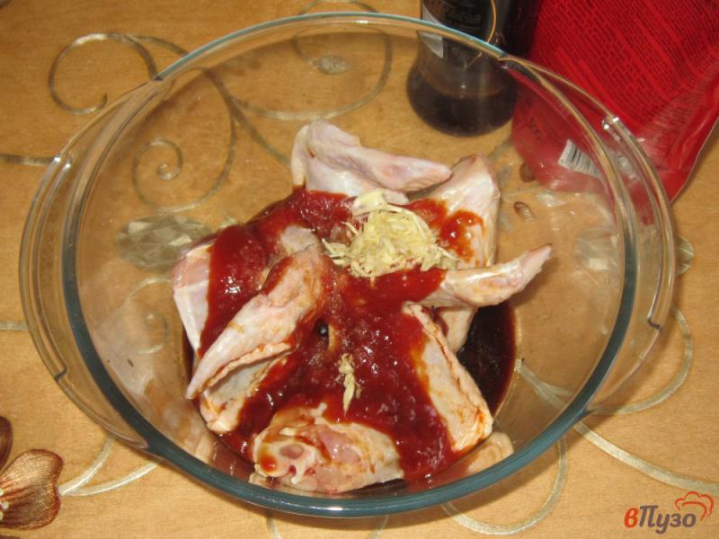 Фото приготовление рецепта: Куриные крылышки в духовке в кетчупе и соевом соусе шаг №2