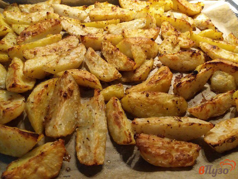 Фото приготовление рецепта: Запеченный пряный картофель шаг №8