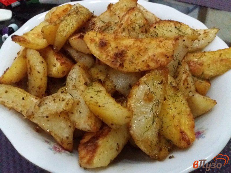 Фото приготовление рецепта: Запеченный пряный картофель шаг №9