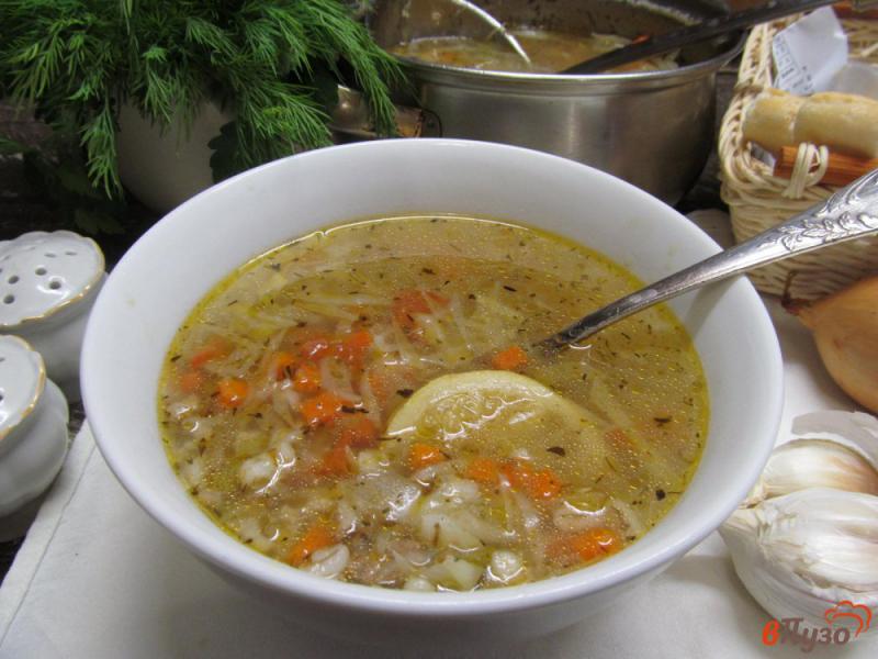 Фото приготовление рецепта: Овощной суп с нутом и мясным фаршем шаг №7